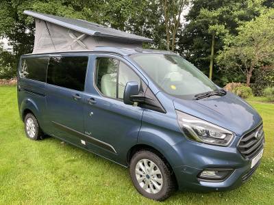 Westfalia Kelsey luxury 4 berth reverse pop top camper van with end washroom 